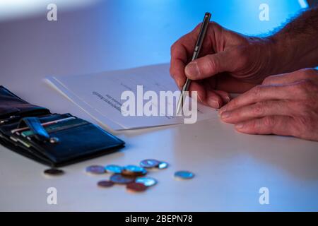 Fill Unemployment benefits form and wallet and money coin Stock Photo