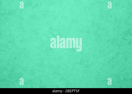 Texture of green decorative plaster or concrete. Abstract background for design. Art stylized banner with copy space for text. Stock Photo