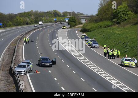 NUMBER PLATE PIXELATED BY PA PICTURE DESK The scene of a crash on the southbound M11 near Chigwell which has been closed after a police pursuit by the Metropolitan Police. Stock Photo