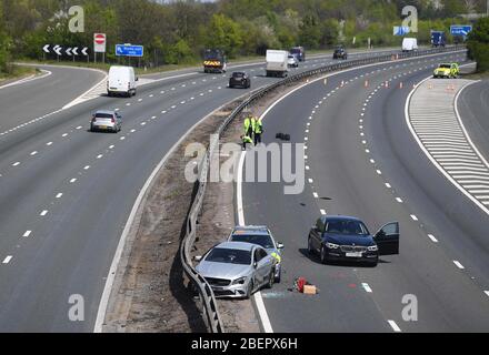 NUMBER PLATE PIXELATED BY PA PICTURE DESK The scene of a crash on the southbound M11 near Chigwell which has been closed after a police pursuit by the Metropolitan Police. Stock Photo