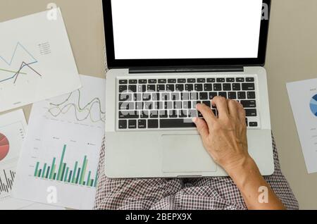 Women working on laptop computers and business documents. Working at home concept. Stock Photo