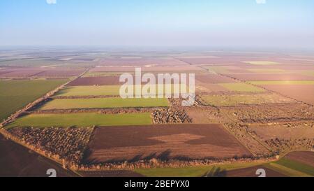 Countryside farm green and brown agriculture fields. Aerial photo Stock Photo