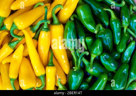 Yellow and green hot peppers closeup. Food photography Stock Photo