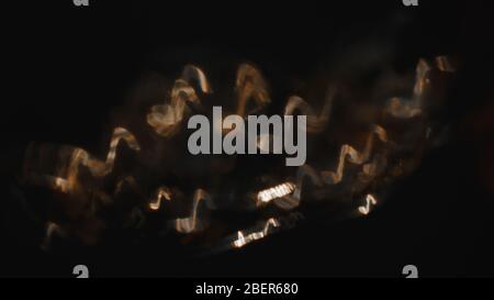 Gold notes on black background Stock Photo
