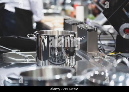 Stainless hotel pans on food warmers with various meals. Roasted meat  pieces with vegetable. Self-service buffet table. Celebration, party,  wedding Stock Photo - Alamy