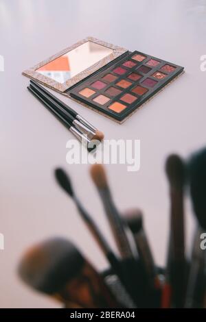 Makeup cosmetics tools background & beauty cosmetics, products & facial cosmetics package lipstick, eyeliner, concealer, mascara, eye shadow stick & h Stock Photo