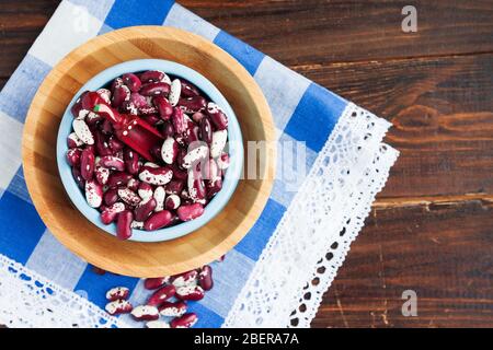 Violet with dots beans in ceramic bowl. Swallow beans. Vegetables for healthy eating. Organic food. Diet Stock Photo