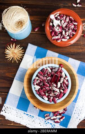 Violet with dots beans in ceramic bowl. Swallow beans. Vegetables for healthy eating. Organic food. Diet Stock Photo