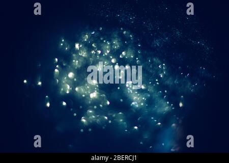 Abstract compositione in blue bokeh on black  background Stock Photo