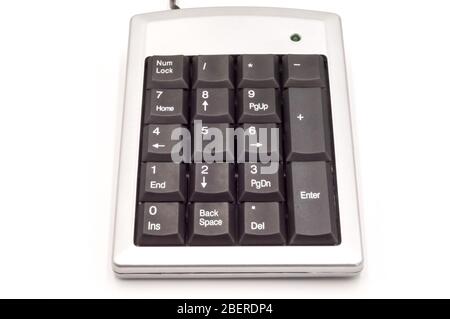Numeric keyboard with metallic edges or numeric keypad isolated white Stock Photo
