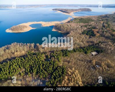 Aerial view of reinforced concrete bunkers belonged to Headquarters of German Land Forces from ww2 hidden in a forest on the Mamry Lake shore, Mamerki Stock Photo