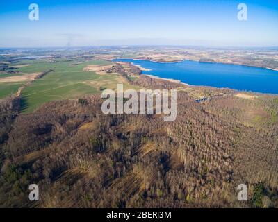 Aerial view of reinforced concrete bunkers belonged to Headquarters of German Land Forces from ww2 hidden in a forest in spring season in Mamerki, Pol Stock Photo