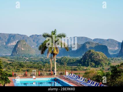 View over Swimming Pool at Horizontes Los Jazmines Hotel towards Vinales Valley, UNESCO World Heritage Site, Pinar del Rio Province, Cuba Stock Photo