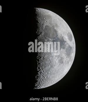The 7 day old first quarter moon. Stock Photo