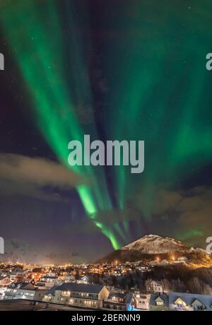 The northern lights over the village of Skjervoy on the northern coast of Norway. Stock Photo