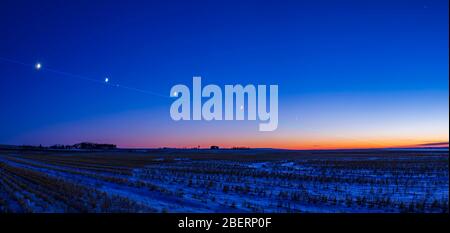 Path of the autumn waxing moon, Alberta, Canada. Stock Photo