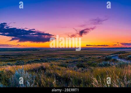 Volcanic twilight at Grasslands National Park, Canada. Stock Photo