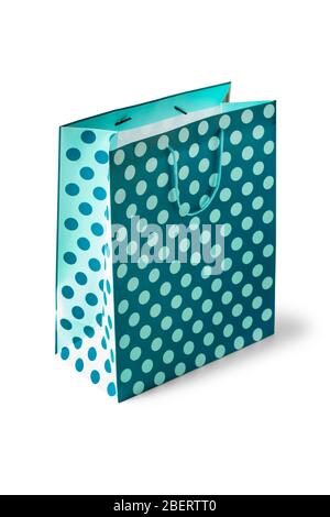Blue polka dot paper gift bag isolated on white background Stock Photo