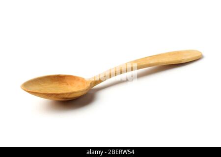 Wooden spoon close up isolated on a white background Stock Photo
