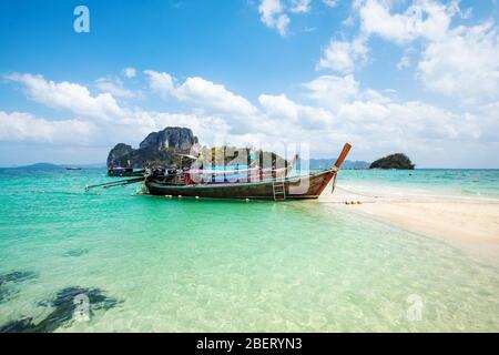 Longtail boat in Tup Island with clear blue waters. Krabi province. Ao Nang, Thailand. Stock Photo