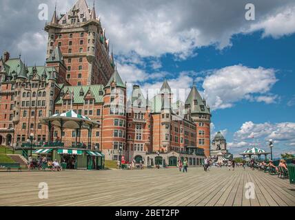 Quebec City, Quebec, Canada, July 2012 - Le Chateau Frontenac towering over the boardwalk and parks of upper Quebec city Stock Photo