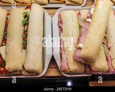 Assortment of paninis / sandwiches ready for cooking Stock Photo