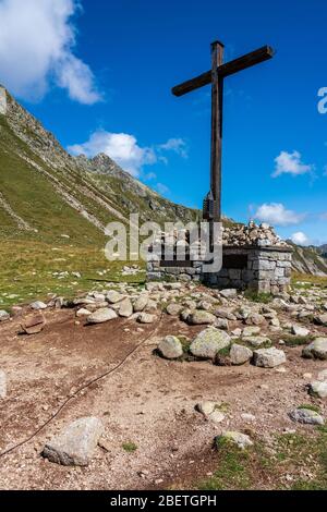 a cross on a mountain top, Italy. Stock Photo
