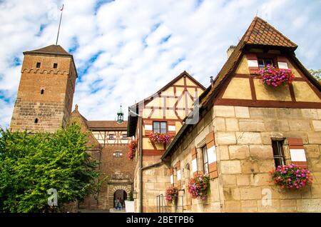 Old medieval castle Heathen Tower Kaiserburg in the city of Nuremberg Nurnberg, Mittelfranken region, Bavaria, Germany Stock Photo