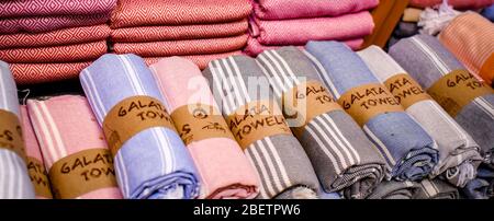 Turkey Istanbul 2019 November 6 folded rolls of towels bed linen Galata Turkish Bazaar fabric Stock Photo