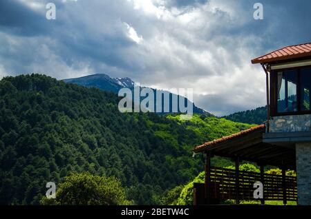 View of mountains Olympus seen from viewing platform near building of tavern cafe, Pieria, Macedonia, Greece Stock Photo