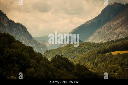 Mountain range and forests of Tara river gorge canyon, view from Durdevica Tara Bridge, Montenegro Stock Photo