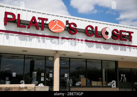 A logo sign outside of a Plato's Closet retail store location in Deptford Township, New Jersey on April 11, 2020. Stock Photo