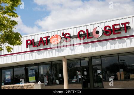 A logo sign outside of a Plato's Closet retail store location in Deptford Township, New Jersey on April 11, 2020. Stock Photo