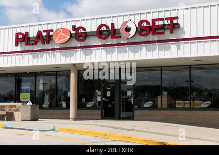 A logo sign outside of a Plato's Closet retail store location in Deptford Township, New Jersey on April 11, 2020. Stock Photo