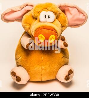 toy stuffed pig in sitting position Stock Photo