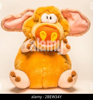 toy stuffed pig in sitting position Stock Photo