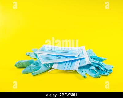 Download Blue Medical Glove And Face Masks On Yellow Covid Stock Photo Alamy PSD Mockup Templates