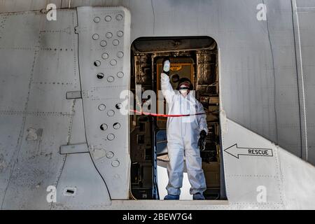 Pittsburgh, United States Of America. 15th Apr, 2020. Pittsburgh, United States of America. 15 April, 2020. U.S. Air Force SSgt. Brian Gula, disinfects the inside of a C-17 Globemaster III cargo aircraft from COVID-19, coronavirus at the Pittsburgh International Airport Air Reserve Station April 15, 2020 in Pittsburgh, Pennsylvania. All Air Force are now disinfected following any mission to help contain the spread of COVID-19, coronavirus. Credit: Joshua J. Seybert/U.S. Air Force/Alamy Live News Stock Photo