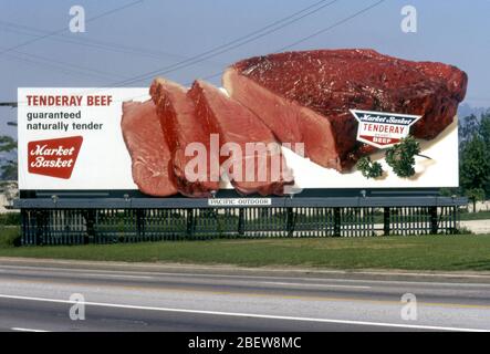 Billboard for Market Basket supermarket featuring Tenderay beef next to a street in Los Angeles, CA Stock Photo