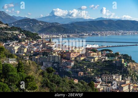 Panoramic view of the Gulf of Salerno with Vietri town in the foreground and Salerno port in the background, Campania, Italy Stock Photo