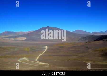 Road to the Socompa border crossing in the Salta highlands, Salta province, Argentina Stock Photo