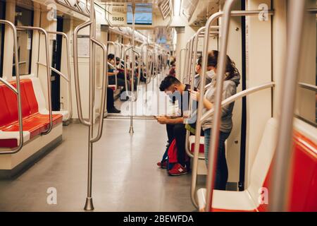 SANTIAGO, CHILE-APRIL 14, 2020 - Santiago Metro wagon almost empty due to the quarantine that affects some communes of the city due to the Covid 19 pa Stock Photo