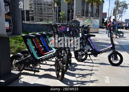 LOS ANGELES, CA/USA - JULY 10, 2019: Mini Electric Bicycles near the Metro Station are replacing rental bikes Stock Photo