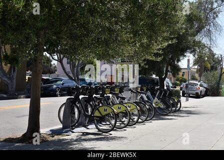 LOS ANGELES, CA/USA - JULY 10, 2019: Metro Ride Sharing Bicycles near the Metro Station on Vermont Street Stock Photo