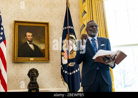 Washington, United States Of America. 10th Apr, 2020. Bishop Harry R. Jackson, Jr., offers an Easter blessing Friday, April 10, 2020, in the Oval Office of the White House People: Bishop Harry R. Jackson, Jr. Credit: Storms Media Group/Alamy Live News Stock Photo