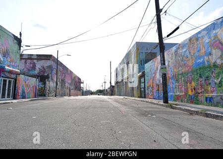 MIAMI BEACH, FL - APRIL 10: COVID-19: Miami Beach has an Eerie calm and quiet to it as tourist attractions and hot spots like Ocean Drive, Lincoln Road, The Design District and the Wynwood Art District all are empty as businessÕs and Florida economy come to a total halt after Florida Gov. Ron DeSantis orders all entertainment venues, restaurants, and beaches to close in Dade, Broward and Palm Beach Counties in the name of public safety an in an effort to slow the spread of the Coronavirus on April 10, 2020 in Miami Beach, Florida People: Wynwood Art District Stock Photo