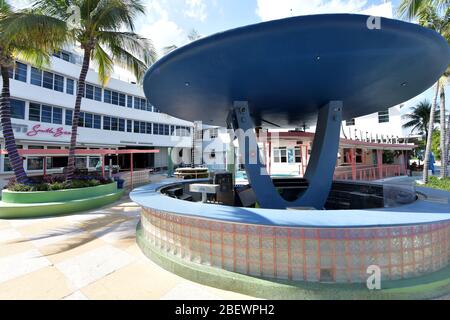 MIAMI BEACH, FL - APRIL 10: COVID-19: Miami Beach has an Eerie calm and quiet to it as tourist attractions and hot spots like Ocean Drive, Lincoln Road, The Design District and the Wynwood Art District all are empty as businessÕs and Florida economy come to a total halt after Florida Gov. Ron DeSantis orders all entertainment venues, restaurants, and beaches to close in Dade, Broward and Palm Beach Counties in the name of public safety an in an effort to slow the spread of the Coronavirus on April 10, 2020 in Miami Beach, Florida People: The Clevelander Bar Stock Photo