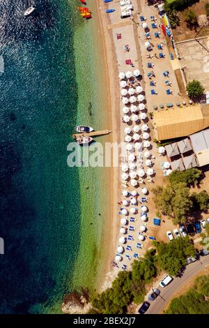 Aerial of paradise beach in mediterranean sea in Greece. Vacation on greek island Corfu. Kalami resort Stock Photo