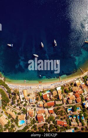 Aerial of a resort in mediterranean sea. Kalami beach on Corfu island in Greece. Greek vacation Stock Photo