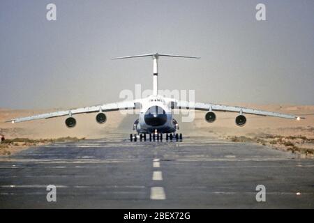 1981 - Front view of a C-5 Galaxy aircraft moving down the runway during exercise Bright Star '82 Stock Photo